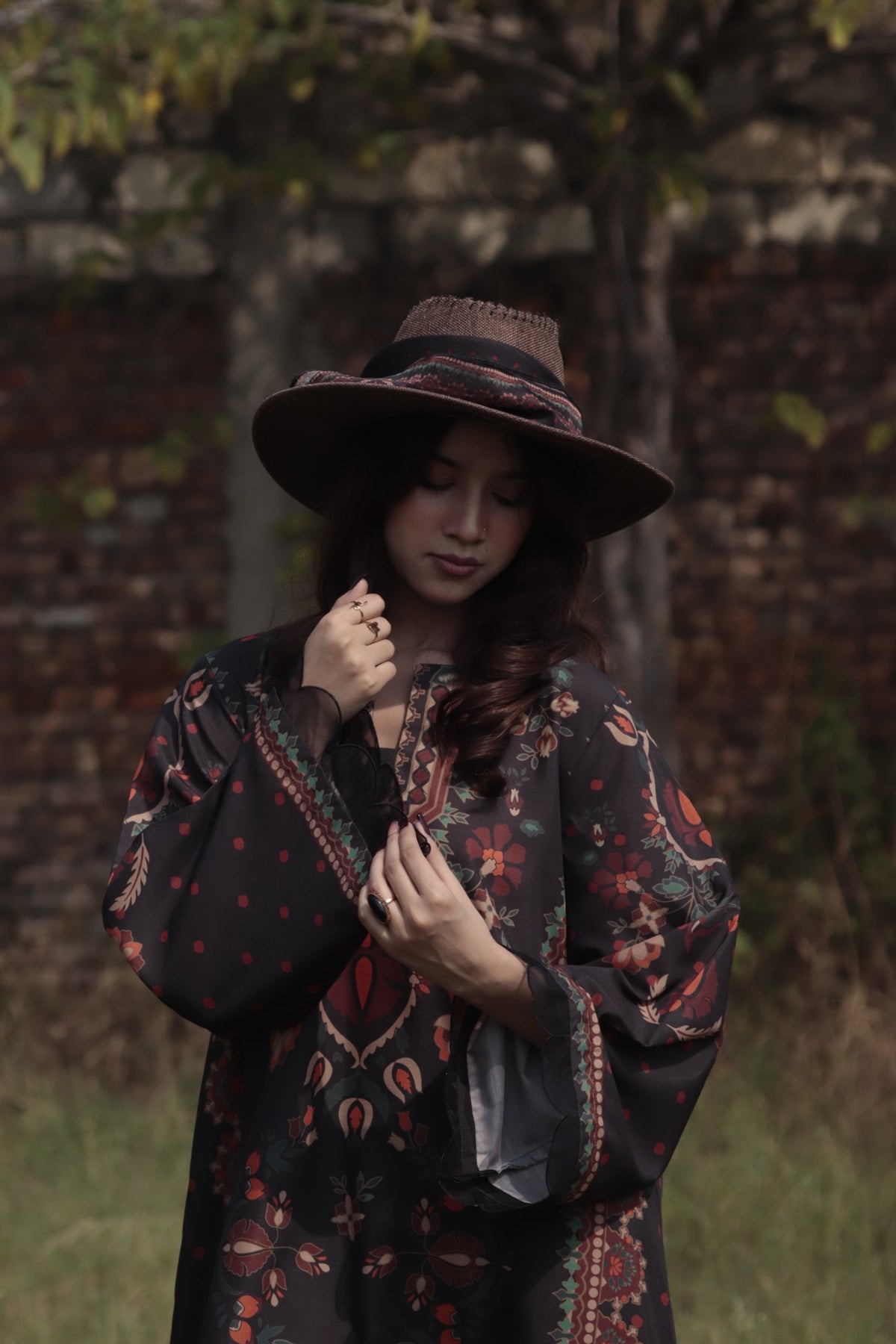 Model in a dark floral CAIRO Bandana look